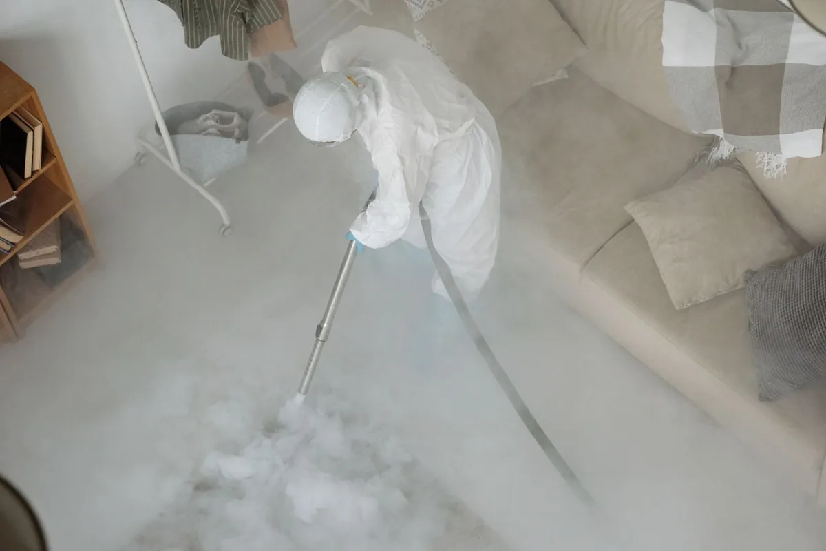 Biohazard cleanup technician in protective equipment, Standish, MI